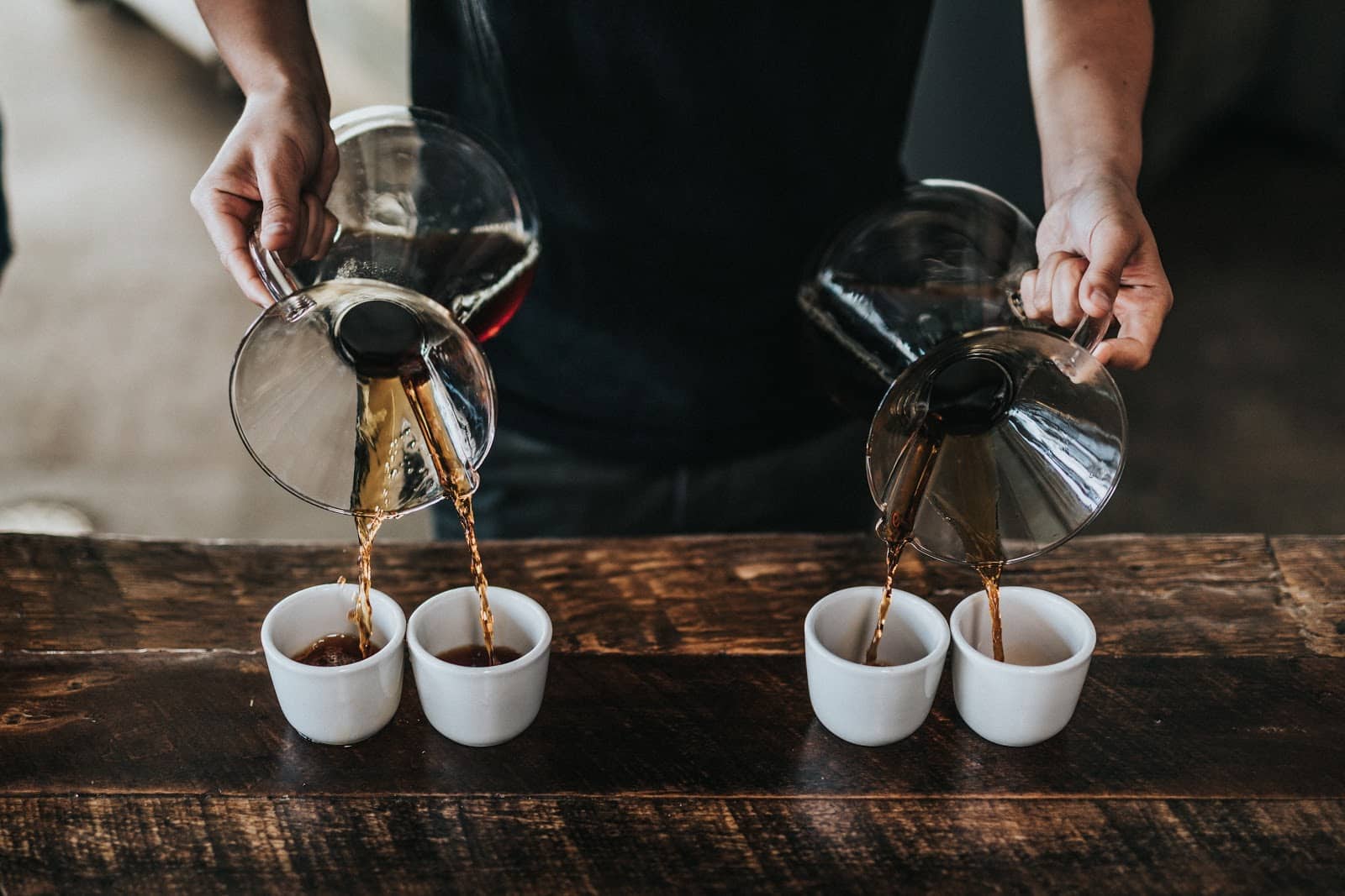 Barista pouring coffee - bar top ideas | RCS
